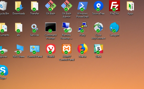 Windows desktop icons have a green tick
